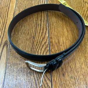 Black genuine leather men’s belt. Approximately size 32”